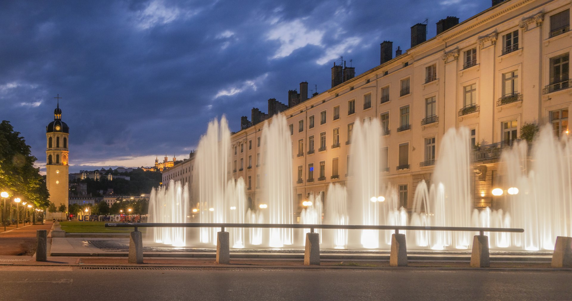 a fountain in front of a building